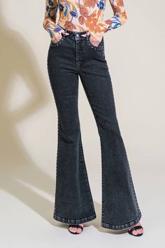 A washed denim pant featuring front closure, pockets and stud embellished side and flare leg Details: Self : 98% Cotton 2% Spandex Size & Fit - Model is 5`8" And Wearing Size Small- Measurements Taken From Size Small- Approx. Length: 43" High Waist Black Denim Flares, Black High-waisted Denim Flares, Edgy Flared Denim Bottoms, Edgy Flare Denim Jeans, Edgy Denim Flare Jeans, Edgy Washed Black Mid-rise Flare Jeans, Edgy Mid-rise Washed Black Flare Jeans, Denim Flare Pants, Visor Hairstyles