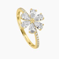 Capture the beauty of nature with this Gold Plated over Sterling Silver Flower Ring. The intricate flower design is crafted with attention to detail and features a radiant gold finish that adds a touch of elegance to any outfit. Perfect for nature lovers, this ring is a timeless piece that you'll treasure for years to come. Gold Flower Ring With Brilliant Cut For Promise, Yellow Gold Brilliant Cut Flower Ring, Fine Jewelry Flower Promise Ring, Yellow Gold Flower-shaped Diamond Ring, Elegant Flower Shaped Crystal Ring, Yellow Gold Flower Diamond Ring With Prong Setting, Cubic Zirconia Yellow Gold Flower Ring, Cubic Zirconia Flower Shaped Fine Jewelry Ring, Cubic Zirconia Flower Ring Fine Jewelry