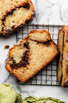 two slices of cinnamon swirl bread on a cooling rack