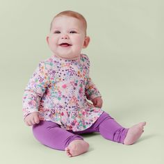 our top + pant set is an everyday ensemble you'll reach for over and over again. the long sleeve shirt has a magnetic closure at the neck—making it easy to pull over the head. it's paired with roomy harem pants that fit over diapers easily and come with a stretchy elastic waist. each piece is made of our signature, soft-on-skin TENCEL™ modal fabric. Playful Fitted Long Sleeve Sets, Stretch Long Sleeve Playtime Set, Stretch Long Sleeve Sets For Playtime, Cotton Sleepwear With Elastic Waistband And Long Sleeves, Cotton Long Sleeve Sleepwear With Elastic Waistband, Playful Long Sleeve Matching Set, Playful Long Sleeve Tops With Matching Set, Playful Long Sleeve Sets For Fall, Fall Playtime Long Sleeve Sets