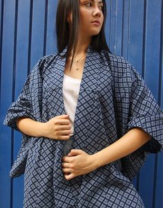 Vintage kimono jacket in blue with a pale blue geometric print. Box sleeves. Fully lined. No fastenings. One size, suitable UK size 6-18 (Eur 34-46). Measurements - 46"(117cm) bust - 12.5"(32cm) sleeve length - 54"(138cm) length. Material - Mixed. Condition - Excellent. Handpicked, repaired and ready to wear. This is an original vintage item, not new and minor signs of wear & age are expected, we will highlight any major flaws. Model is a UK 6/8 and is 5'7" tall. Vintage Kimono Jacket, Short Kimono Jacket, Printed Kimono, Kimono Vintage, Blue Kimono, Short Kimono, Print Box, Print Kimonos, Long Kimono