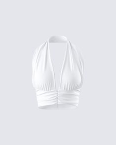 Elevate your wardrobe a bit with this ivory halter top ✨ Crafted from stretch jersey fabric, complete with a halter neckline, cropped length, and open back - this top has you covered for a head-turning look 🤍 White Halter Top Outfit Summer, Trendy Fitted White Halter Top, White Halter Top Outfit, Halter Top Outfit Summer, White Halter Neck Top With Bra-friendly Design, Luxury Fitted White Halter Top, White Seamless Halter Neck Top, White Summer Halter Top With T-back, Halter Top Outfit