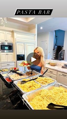 a woman is making pasta in her kitchen with the words pasta bar overlayed