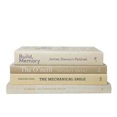 three books stacked on top of each other in front of a white background with the title'the mechanical smile '