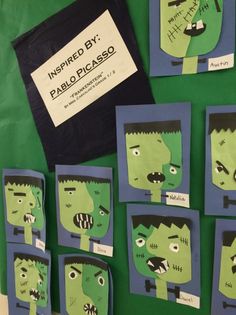 several pieces of paper cut out to look like zombie faces on a green background with black border around them