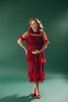 Introducing our stylish and versatile maternity dress. It features a loose and romantic cut, perfect for any occasion. The dress consists of two parts: a combination of an adjustable-strap underdress and a soft tulle overlay adorned with elegant ruffles. It's ideal for baby showers, weddings, or any special event. With its midi length and convenient button closure at the back, it offers both comfort and style. Made from a body-friendly viscose fabric, this dress is designed to be worn during and Maternity Ball Gowns, Gloves Wedding Dress, Dress For Baby Shower, Tulle Maternity Dress, Maternity Dresses For Baby Shower, Midi Wedding Dress, Dress Name, Dress For Baby, Pregnant Wedding Dress