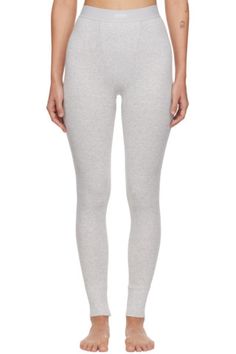 SKIMS: Gray Cotton Leggings | SSENSE Gray Elastane Leggings For Loungewear, Fitted Gray Cotton Activewear, Gray Stretch Cotton Activewear, Gray Stretchy Cotton Activewear, Gray Tight Fit Activewear For Loungewear, Textile Logo, Ribbed Leggings, Cotton Leggings, Grey Cotton