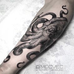 an octopus tattoo on the arm