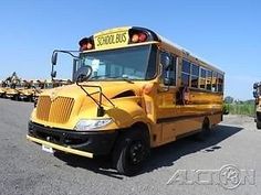 two school buses parked next to each other