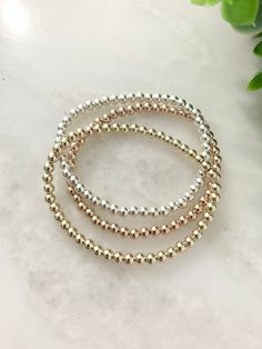 "This listing is for 1 single bracelet or 3 layering metal bead bracelets  * 4mm high quality metal beads available in 14k gold fill, 14k rose gold fill, or sterling silver * Perfect for layering and creating your own or adding to bracelet stacks  ✨message me for more customizations :: Wrist size ::  6\" - 6.5\": Small/tighter fit  6.75\" - 7.25\":Medium/average fit 7.5\" - 8\": large/looser fit Measure around your wrist in inches and add 1/4 for a tighter \"fitted\" bracelet, add 1/2\" for an a Rose Gold Stackable Sterling Silver Bracelets, Dainty Rose Gold Stackable Bracelets, Minimalist Nickel-free Rose Gold Bracelets, Delicate Stackable Rose Gold Bracelets, Delicate Rose Gold Stackable Bracelets, Stackable Rose Gold Bracelets In 14k Gold Filled, Dainty Nickel-free Beaded Bracelets, Dainty Rose Gold Stackable Beaded Bracelets, Dainty Hypoallergenic Rose Gold Bracelets