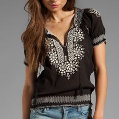 Nwt Joie Jamine Embroidered Top Caviar (Black) 100% Cotton Size Xs Hand Wash, Front Tie Closure Casual Embroidered V-neck Top, Black V-neck Tops With Floral Embroidery, Casual Black Top With Embroidered Hem, Fitted Black Embroidered Top For Festival, Black Bohemian Top With Embroidered Hem, Black Casual Top With Geometric Embroidery, Black Summer Blouse With Geometric Embroidery, Black Cotton Top With Geometric Embroidery, Casual Black Tops With Geometric Embroidery