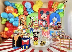 mickey mouse birthday party with balloons and decorations