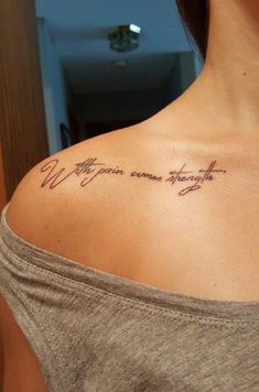 a woman with a tattoo on her shoulder that says, we are your own strength