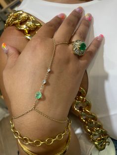 Made with solid 14K yellow gold, and natural Colombian emerald and diamonds. One size fits most, please inquire with you middle finger ring size and wrist side to confirm.  Custom adjustments provided Finger Wrist Bracelet, Finger To Wrist Bracelet, Chain Ring Bracelet, Gold Hand Chain, Maximalist Jewelry, Finger Bracelets, Hand Chain Bracelet, Middle Finger Ring, Personal Closet