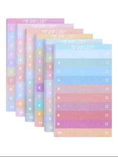 five pastel notebooks with numbers on them