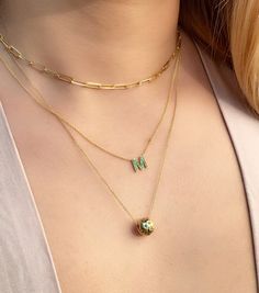 "Personalized 14K solid gold upper case initial necklace is a signature, timeless piece. This version is covered colorful natural green emeralds. The chain is adjustable from 16\" to 21\" long, featuring a spring clasp closure. The necklace is entirely 14K gold and the initial can be personalized. Just leave your preferred initial at checkout. Details: - 14K solid gold - The initial is 8mm - ..23ct of natural green emerald - Available in white, yellow, and rose gold and length from 14\" to 21\" M Initial Necklace, Initial Gold Necklace, 14k Gold Initial Necklace, Paper Clip Chain Necklace, M Initial, Gold Chain Link Necklace, Solid Necklace, Initial M, Jewelry Name