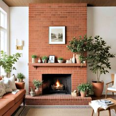 a living room with a fire place and potted plants on the fireplace mantel