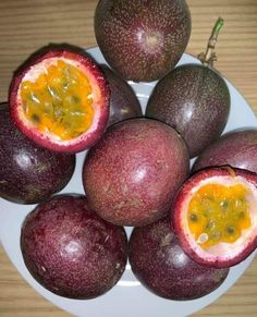 some fruit is sitting on a white plate