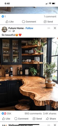 an image of a kitchen counter made out of wood and surrounded by black cabinetry