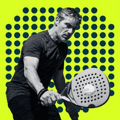 a man holding a tennis racquet on top of a green and blue background