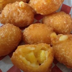 some fried food is on a plate and it looks like they are ready to be eaten