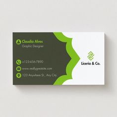 the business card is designed to look like it has green and white accents on it