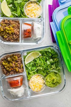 three plastic containers filled with different types of food and salads on top of each other