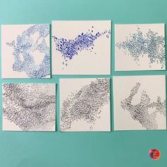 six handmade cards with blue ink on them