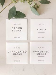 four square coasters with the words brown sugar and granulated sugar on them