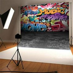 an image of a photo studio with graffiti on the wall