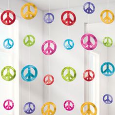 multicolored peace signs hanging from the ceiling