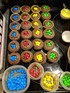 cupcakes and other dessert items on a tray