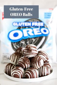 gluten free oreo balls on a plate with the bag in the background