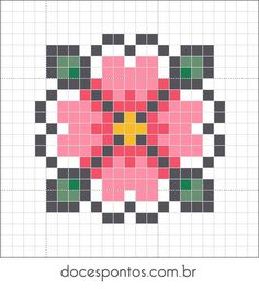 a cross stitch pattern with pink and green squares in the shape of a flower on a white background