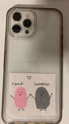 an iphone case with two cute little monsters on it's back and the words rand