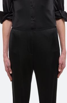 Liquid jersey lends a graceful drape to these wear-everywhere pants. 32" inseam; 19" leg opening; 10" front rise; 15" back rise (size Medium) Front slant pockets 100% viscose Dry clean Imported Sleek Formal Pants With Elastic Waistband, Sleek Fitted Tapered Leg Bottoms, Elegant Tapered Long Pants, Tailored Ankle-length Pants For Evening, Sleek Full-length Pants With Minimal Stretch, Sleek Full Length Pants With Minimal Stretch, Straight Leg Bottoms With Elastic Waistband For Evening, Evening Bottoms With Elastic Waistband Straight Pants, Sleek Fitted Bottoms