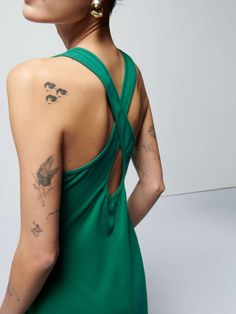 With a chic U neck, cross back straps with a keyhole cutout, and a built-in self shelf bra, this dress gives an effortlessly feminine feel. It's the midi dress you'll wanna wear everywhere. | Women's Merethe Midi Dress in Verdant Green | Ethical Essentials Spring Dresses With Cutout And Cross Back, Spring Dress With Cutout And Cross Back, Fitted Midi Dress With Crisscross Straps And Cross Back, Summer Dresses With Cutout And Cross Back, Spring Midi Dress With Crisscross Straps And Cross Back, Spring Backless Dress With Crisscross Straps, Chic Midi Dress With Crisscross Straps And Cross Back, Strappy Back Dresses With Built-in Bra, Tie Back Cross Back Dress