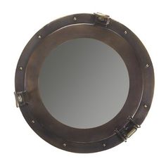 the porthole mirror is made from metal and has rivets on the sides