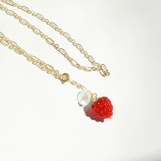 A refreshing addition to your summer outfit, this fruity necklace features a cute glass raspberry and a mother of pearl flower on a shiny golden chain with a front closure. Length adjustable. Handcrafted Material: lampwork glass, gemstone, 18k gold plated sterling silver Fruit Beads, Flower Charm Necklace, Very Berry, Golden Chain, Pearl Flower, Jewelry Inspo, Flower Charm, A Mother, Gold Plated Sterling Silver