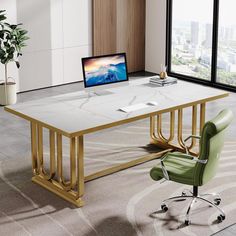 a desk with a computer on it in an office space next to a large window