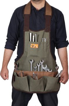 PRICES MAY VARY. Made with heavy-duty Duckwear canvas, the SuperWaist Apron features 16 assorted tool and fastener pockets. It is designed with 2 web hammer loops on each side This apron is ideal for professional carpenters and DIY projects alike. Can fit up to a 52-inch waist. The waist strap is fully adjustable with a quick-release buckle. Be prepared for all of your jobs with the Sixteen pockets and two hammer loops on this Super Waist Apron. Made of heavy-duty Duck wear canvas, the Super Wai Vintage Apron Pattern, Ropa Upcycling, Tool Apron, Restaurant Uniforms, Denim Bag Diy, Leather Working Patterns, Work Apron, Denim Apron, Work Aprons