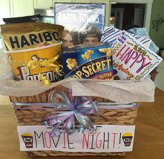 the movie night gift basket is ready for someone to give it as a birthday present