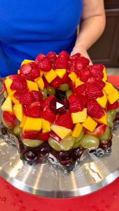 there is a cake with fruit on it