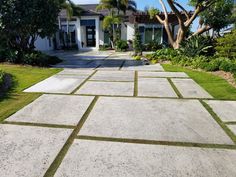 a large driveway in front of a house