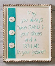 a sign that says may you always have sand in your shoes and a dollar in your pocket