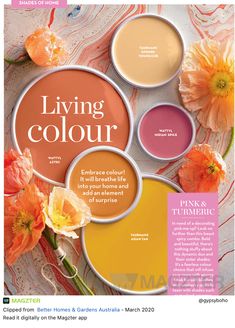 an advertisement for pink and turment's living color range with flowers on the table