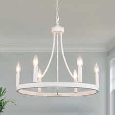 This modern farmhouse dining chandelier has a 59 in hanging chain so you can customize the length to get the perfect height. If you are looking for a ceiling for sloped ceiling, slanted ceiling, flat ceiling, or vaulted ceilings, this wagon wheel chandelier will be a good option. This Lighting Fixtures Hanging can make your home more retro farmhouse style, which is perfect for a farmhouse, dining room, living room, kitchen, barn, living room, entryway, or foyer. Chandelier Small Living Room, Farmhouse Bedroom Chandelier, White Farmhouse Kitchen Ceiling Lights, Brushed Nickel Chandelier Dining Room, Modern Farmhouse Chandelier Dining Rooms Lowe's, Farmhouse Chandelier Kitchen Lowe's, Farmhouse Chandelier Foyer Homeclick.com, Farmhouse Chandelier Foyer 36”, Kitchen Table Lighting