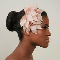 a woman with a flower in her hair