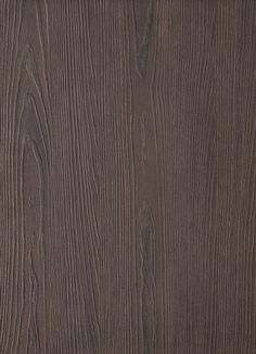 a close up view of the wood grains on this flooring material, which is dark brown