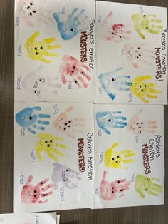 four handprints with different colors on them